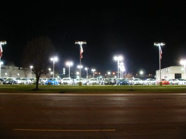 Auto dealership with poor yard lighting.