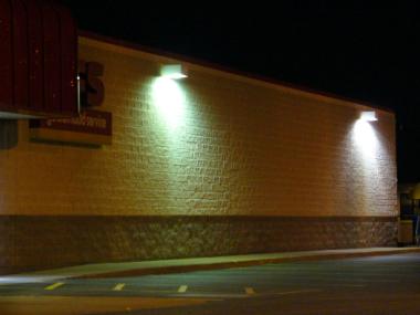 Shielded wall-mounted lights direct their light output where it is needed.