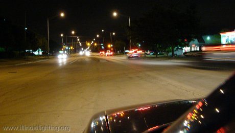 Roadway with overhead streetlights installed.