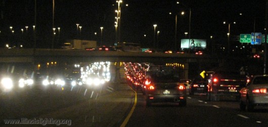 Busy highway with multiple light sources.